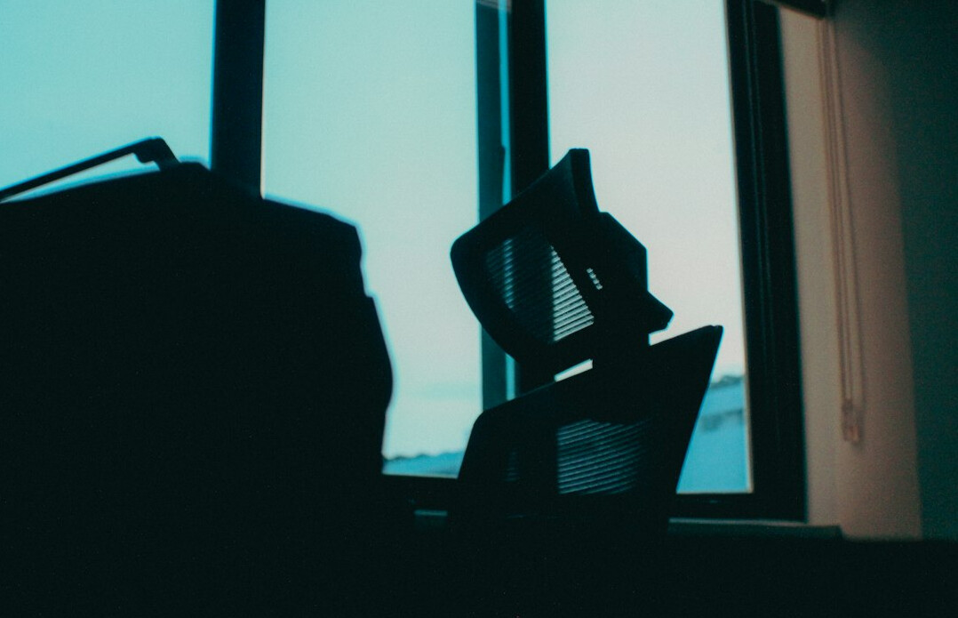 man reflecting in quiet office